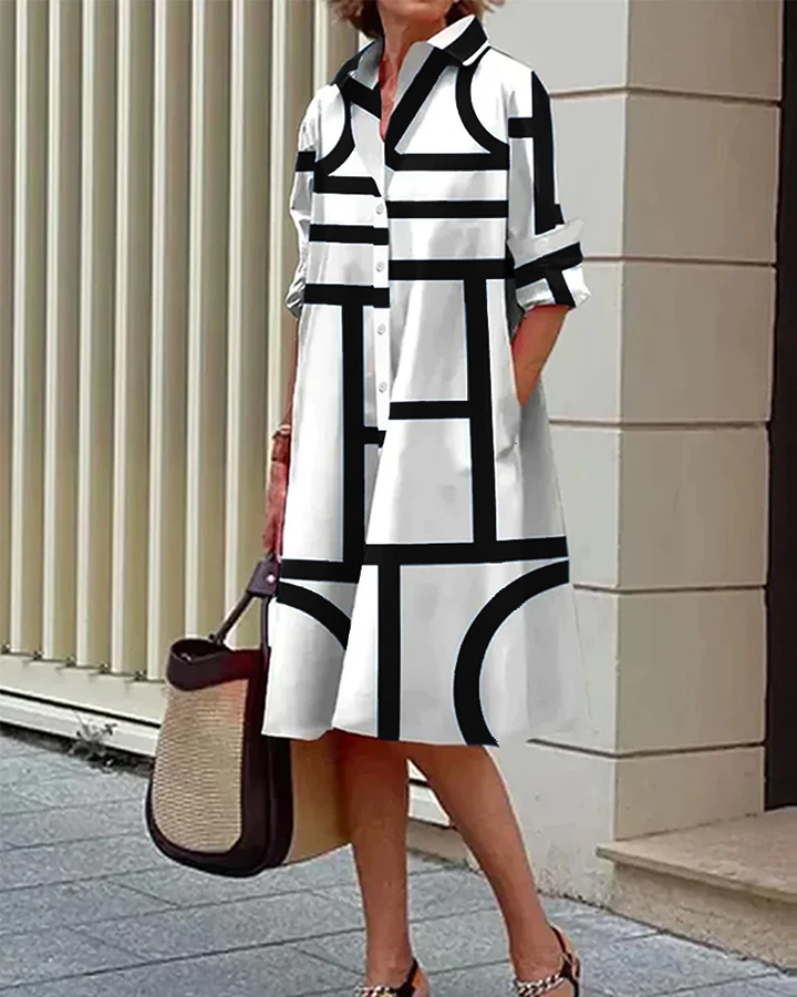 Robe femme Estelle, motif géométrique vif, poches fonctionnelles, alliant élégance et confort.