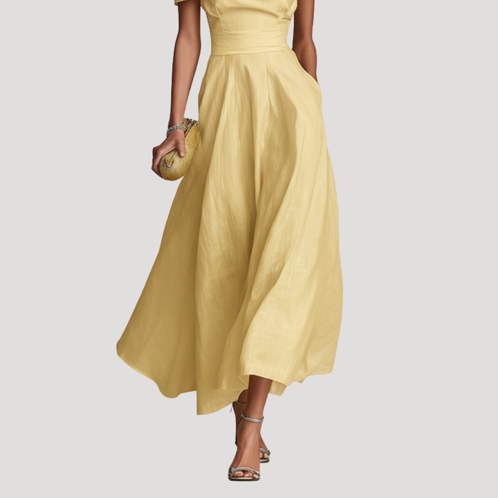 Robe de soirée longue jaune asymétrique pour femme, ajustée et élégante, parfaite pour un look chic en cérémonie.