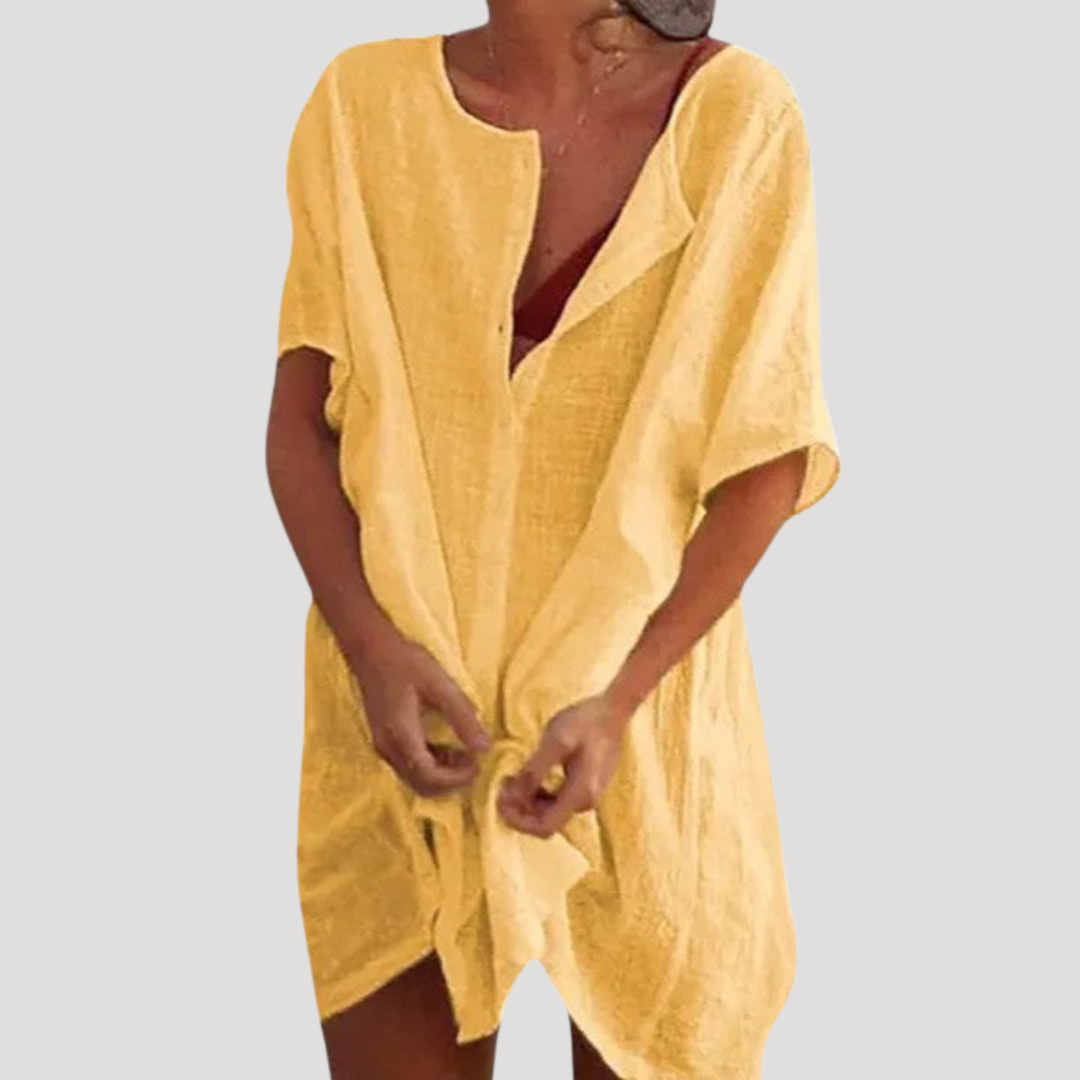 Robe femme ample et polyvalente, col V, parfaite pour un style décontracté chic.