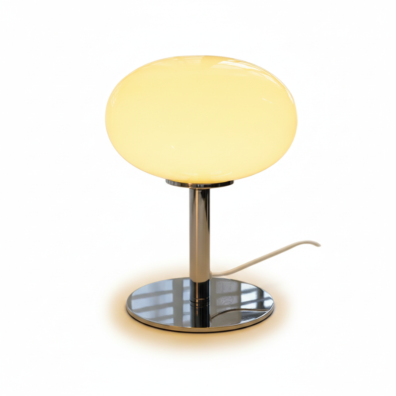 Lampe de table design LED, rechargeable et portable, apporte une touche moderne à votre salon.