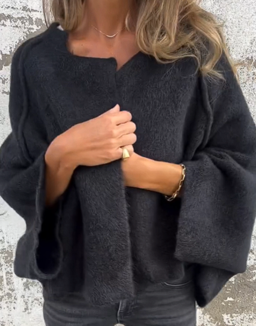 Magnifique cardigan tricoté pour femme, coupe oversize et ouvert. Idéal pour une chaleur douillette et tendance en hiver.