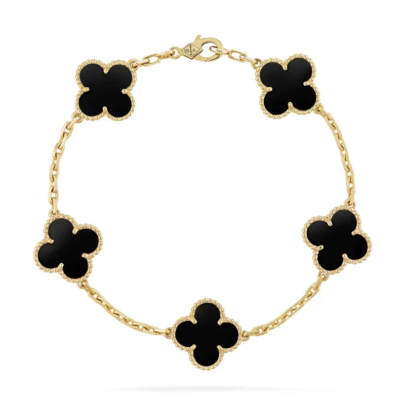 Bracelet élégant trèfle noir doré 18K, hypoallergénique, un bijou femme moderne et raffiné.