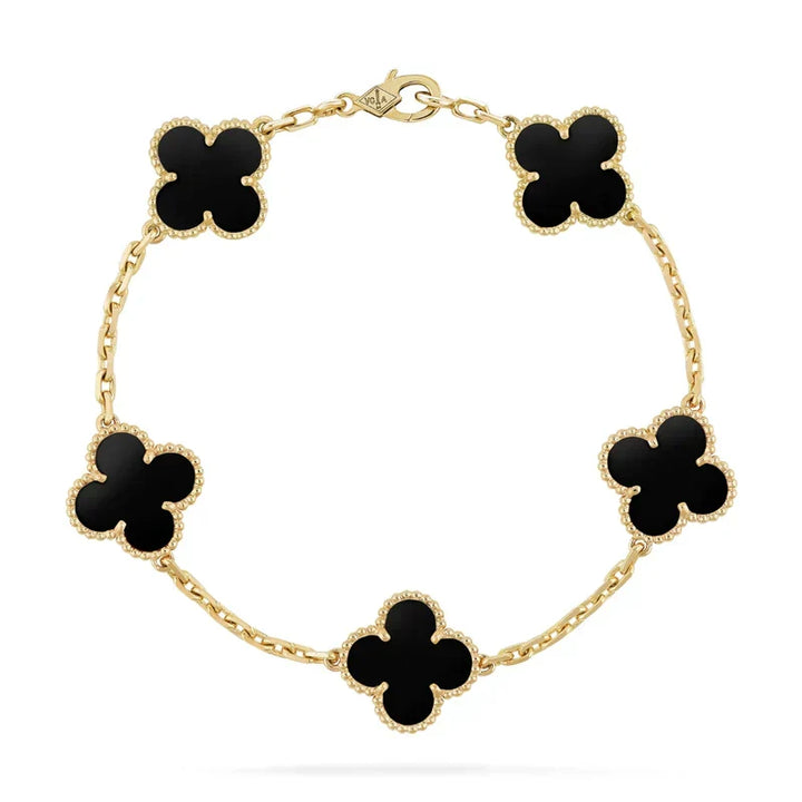 Bracelet élégant trèfle noir doré 18K, hypoallergénique, un bijou femme moderne et raffiné.