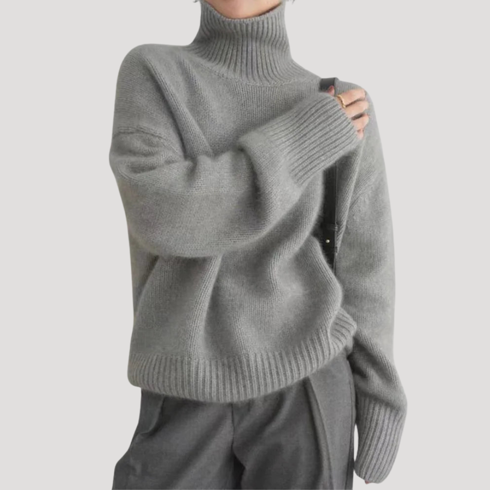 Chandail femme élégant en maille oversize, avec col roulé, idéal pour une mode femme chic et chaleureuse.