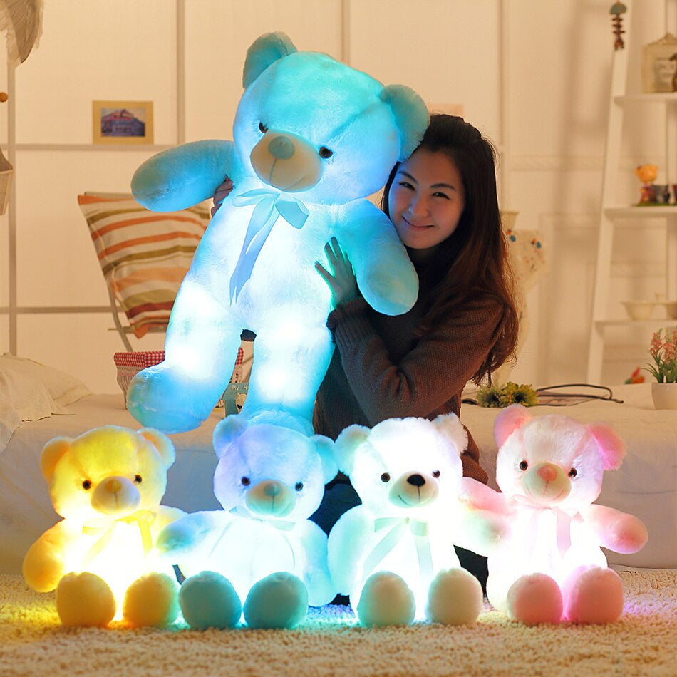 Peluche veilleuse LumiBear avec lumière LED apaisante pour enfant, doudou compagnon de sommeil doux.