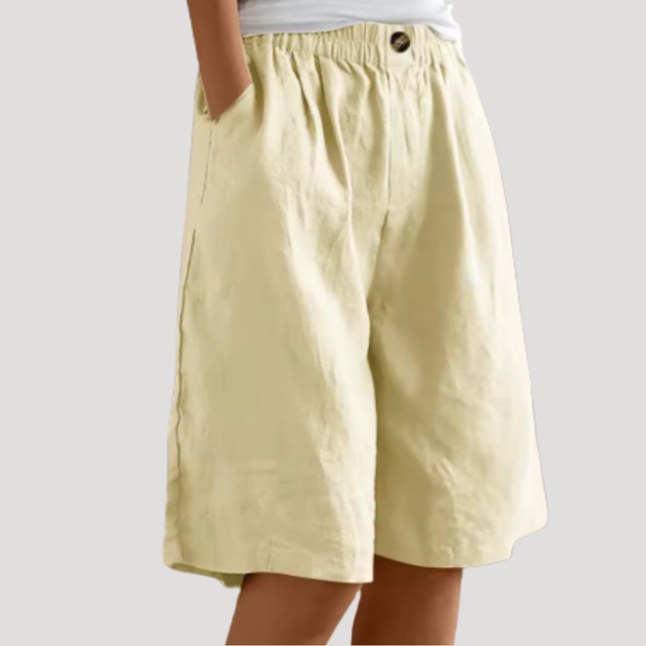 Bermuda chic femme, coupe ample et élégante, taille élastique. Un pantalon court mode pour l'été.
