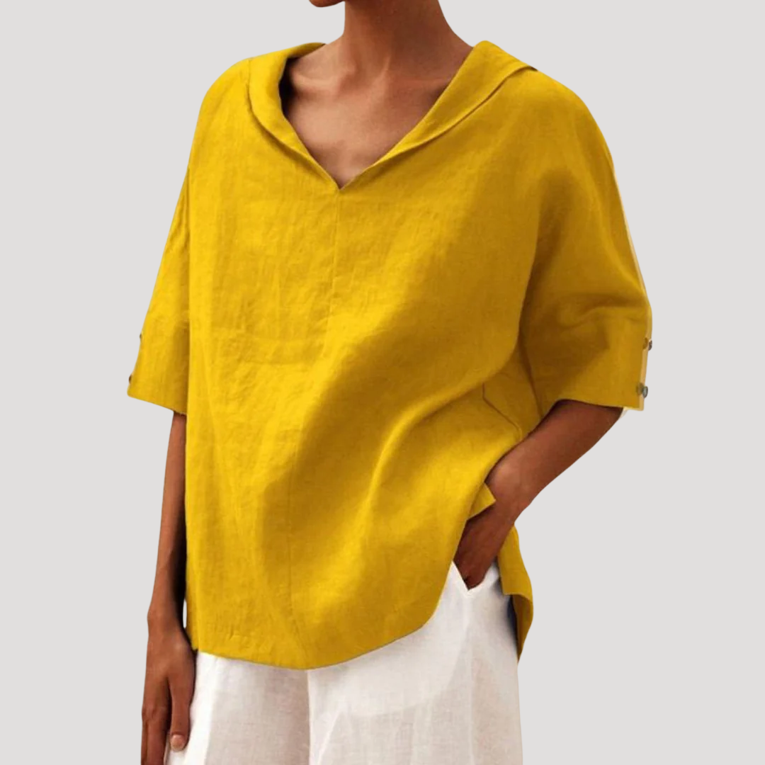 Mode femme: Blouse ample à manches courtes et col ouvert. Tenue décontractée et fluide, confortable et chic.