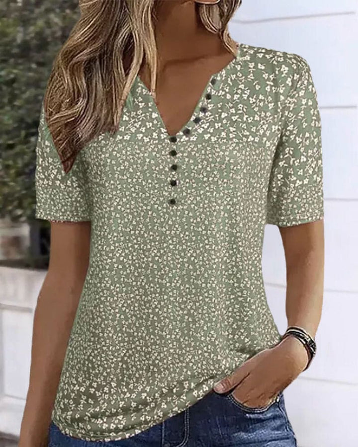 T-shirt femme fleuri stretch à manches courtes. Imprimé floral estival, mode féminine décontractée et confortable.
