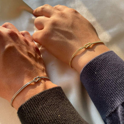 Bracelet réglable femme, accessoire chic avec nœud délicat, intemporel et moderne.