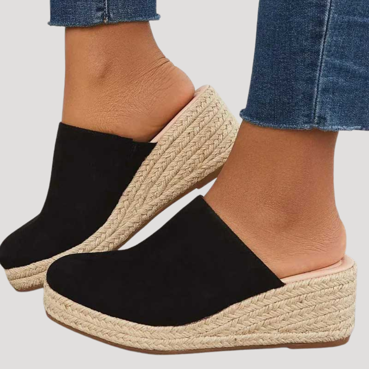Chaussures femme mules espadrilles compensées, offrant un style élégant et confortable pour la mode d'été.