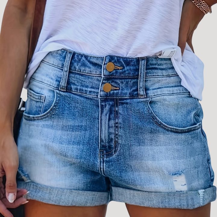 Détail du tissu confortable d'un short femme taille haute sculptant bleu, essentiel pour l'été et la mode.