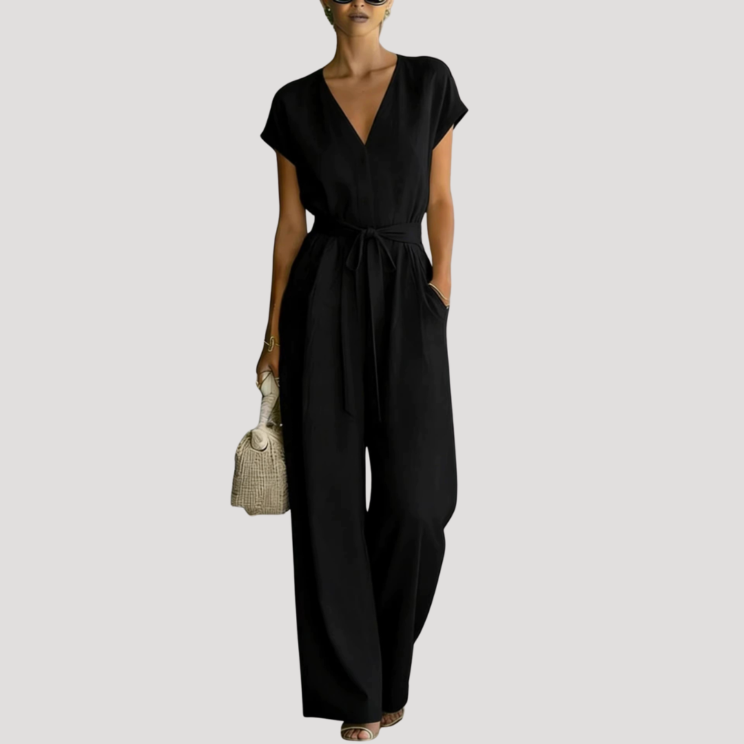 Superbe combinaison femme chic habillée, col V, avec ceinture. Tenue féminine élégante pour toute occasion.