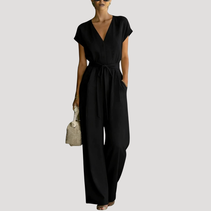 Superbe combinaison femme chic habillée, col V, avec ceinture. Tenue féminine élégante pour toute occasion.
