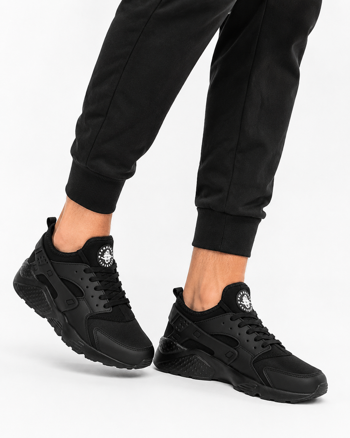 Chaussures de sport unisexes en maille respirante, flexibles avec semelle souple pour un confort optimal.