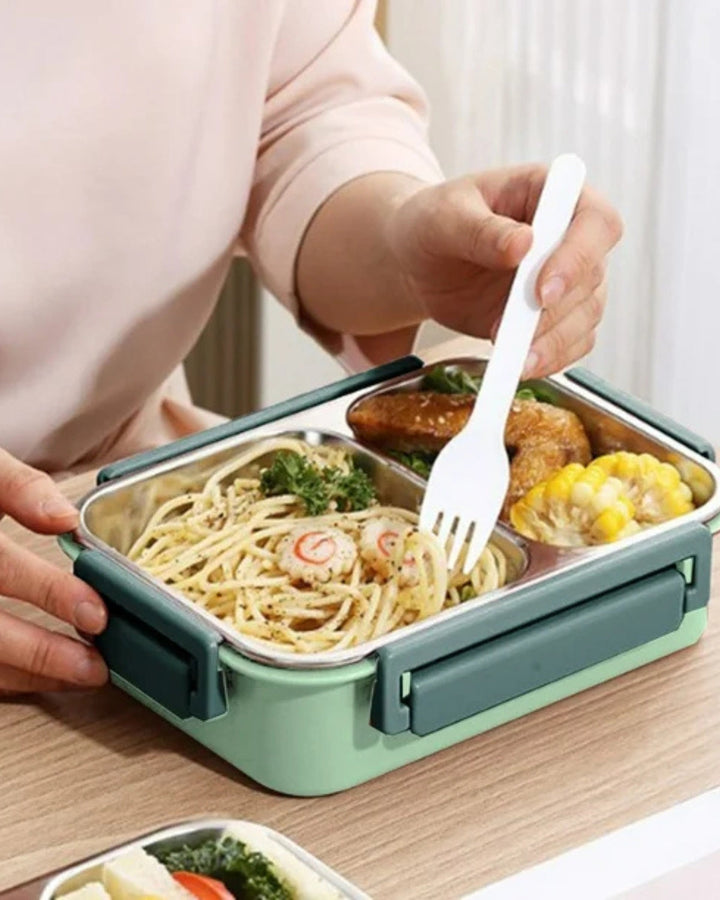 Conteneur alimentaire isolé vert avec couvercle hermétique pour repas frais.