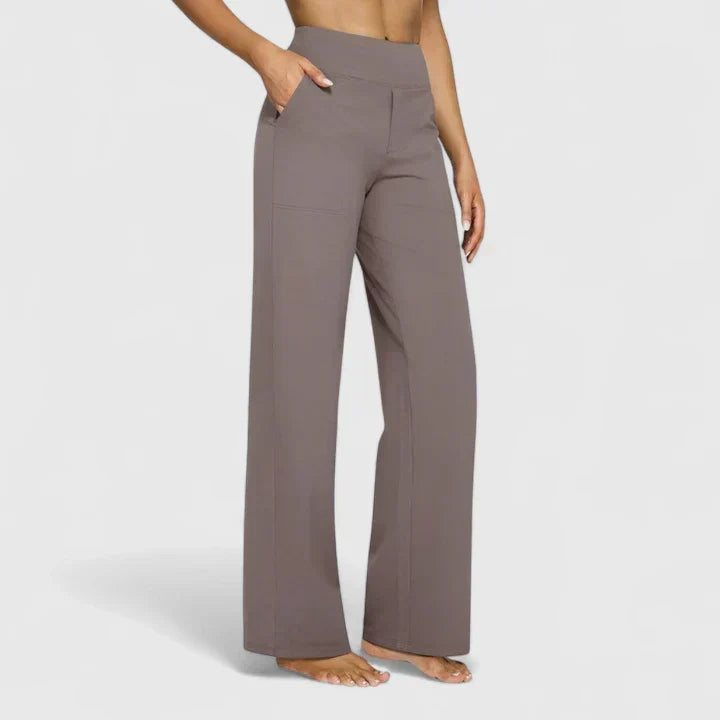 Pantalon femme polyvalent, taille haute, jambe droite, parfait pour un look élégant ou relax.