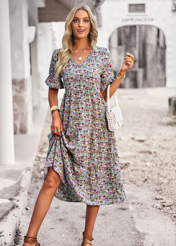 Confortable robe midi fleurie femme, design classique élégant, idéale pour les beaux jours du printemps-été.