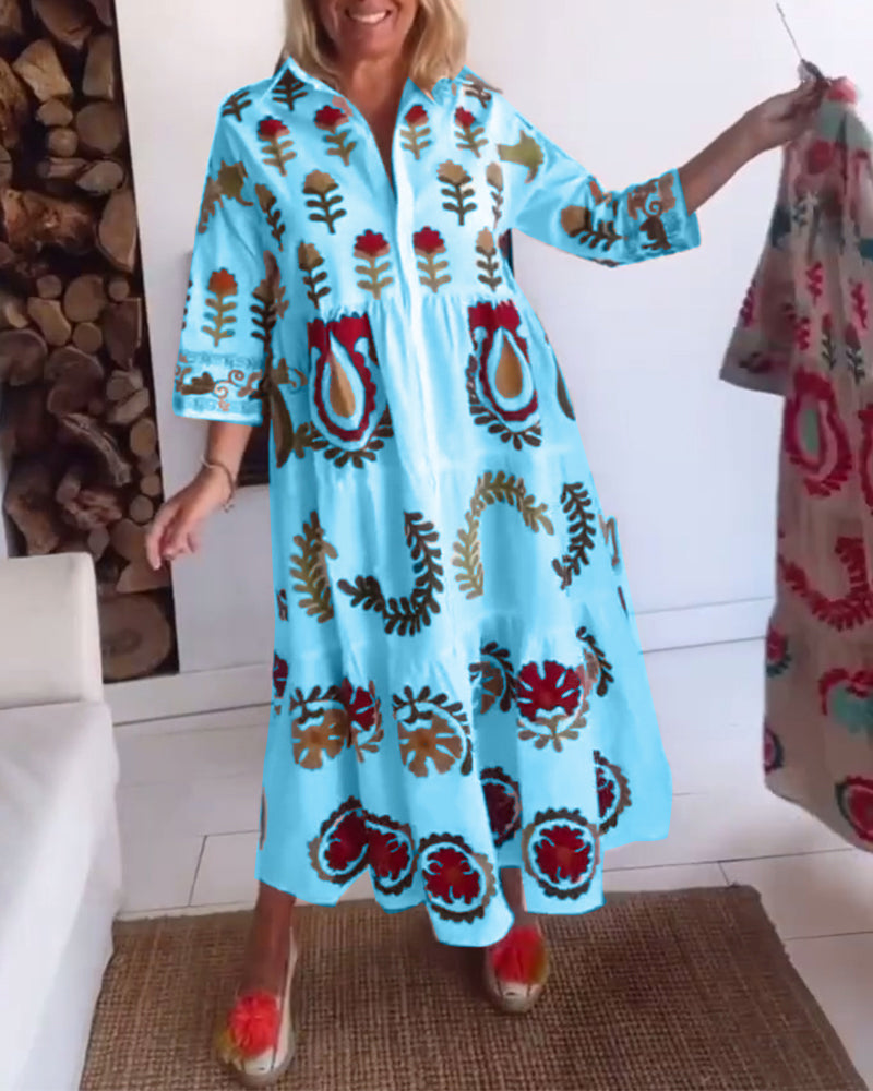 Robe femme fluide avec motifs floraux, longueur midi, parfaite pour l'élégance estivale.