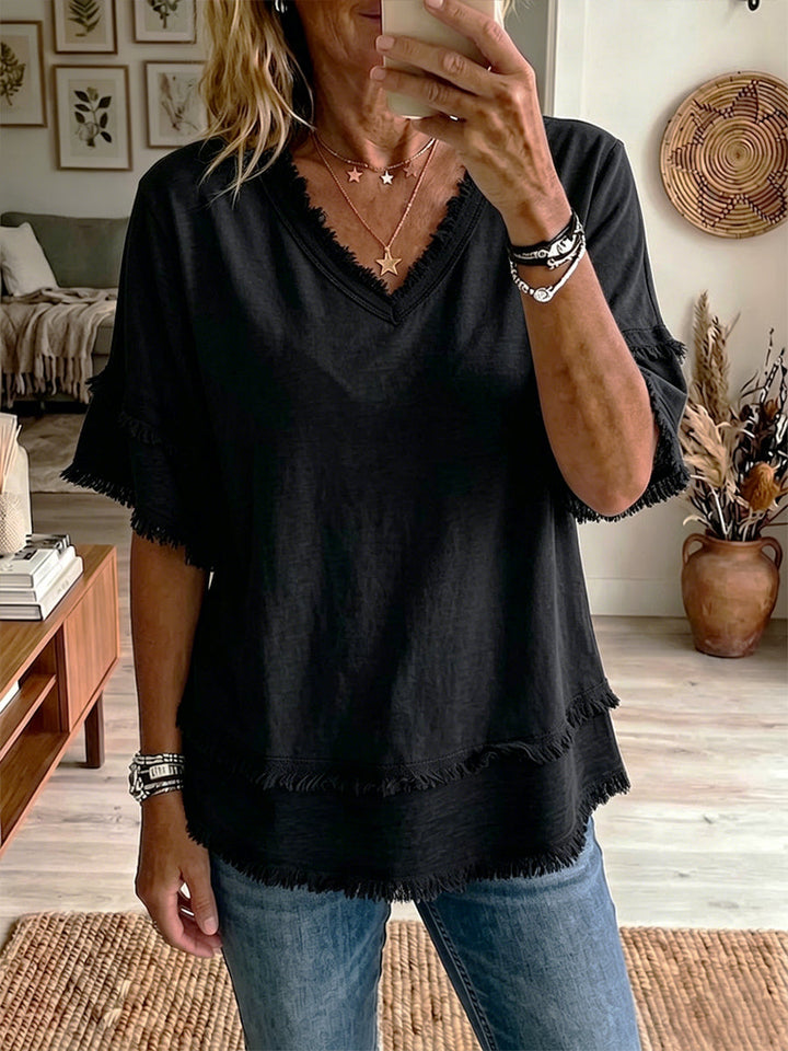 Haut femme chic en lin, col V, coupe décontractée élégante, mode estivale versatile et confortable.