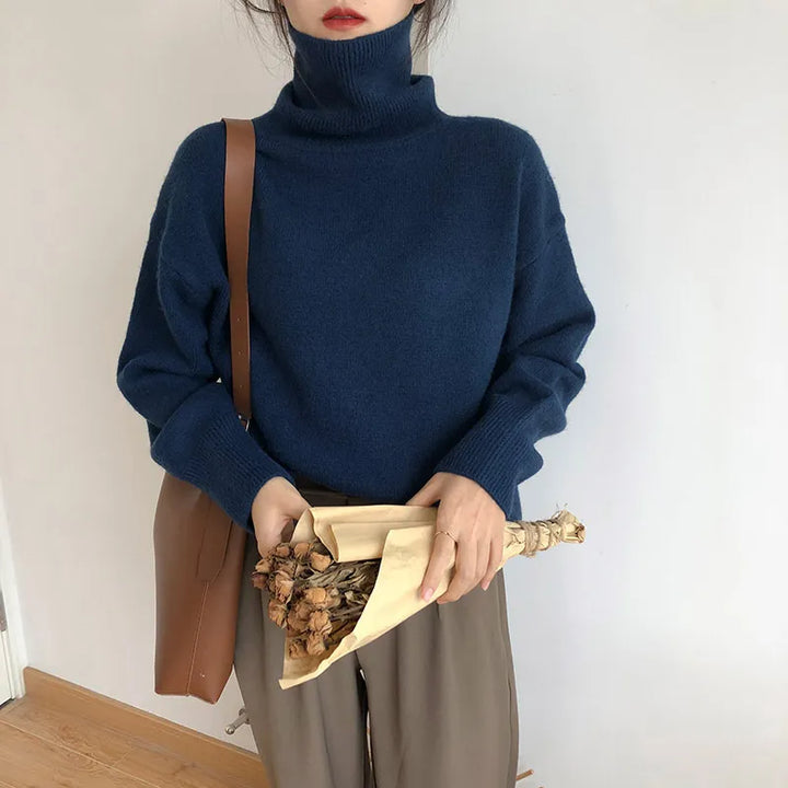 Pull-over matelassé col roulé femme, chaleur et confort optimal pour l'hiver. Un essentiel tendance.