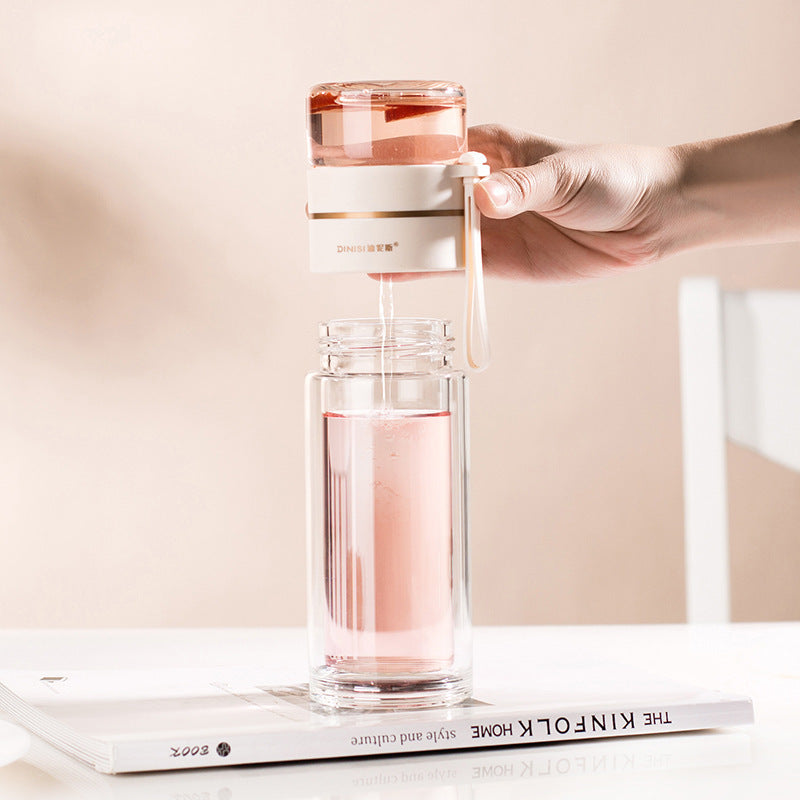 Bouteille de voyage PureBrew réutilisable en verre avec infuseur à thé, parfaite pour transporter vos boissons.
