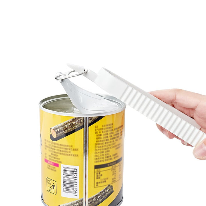 GripOpener blanc, l'ouvre-boîtes et bouteilles ergonomique indispensable pour faciliter vos tâches de cuisine.