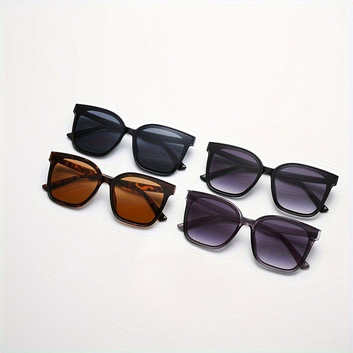 Photographie de lunettes de soleil carrées chic en acétate pour femme. Protection UV garantie, un must-have.