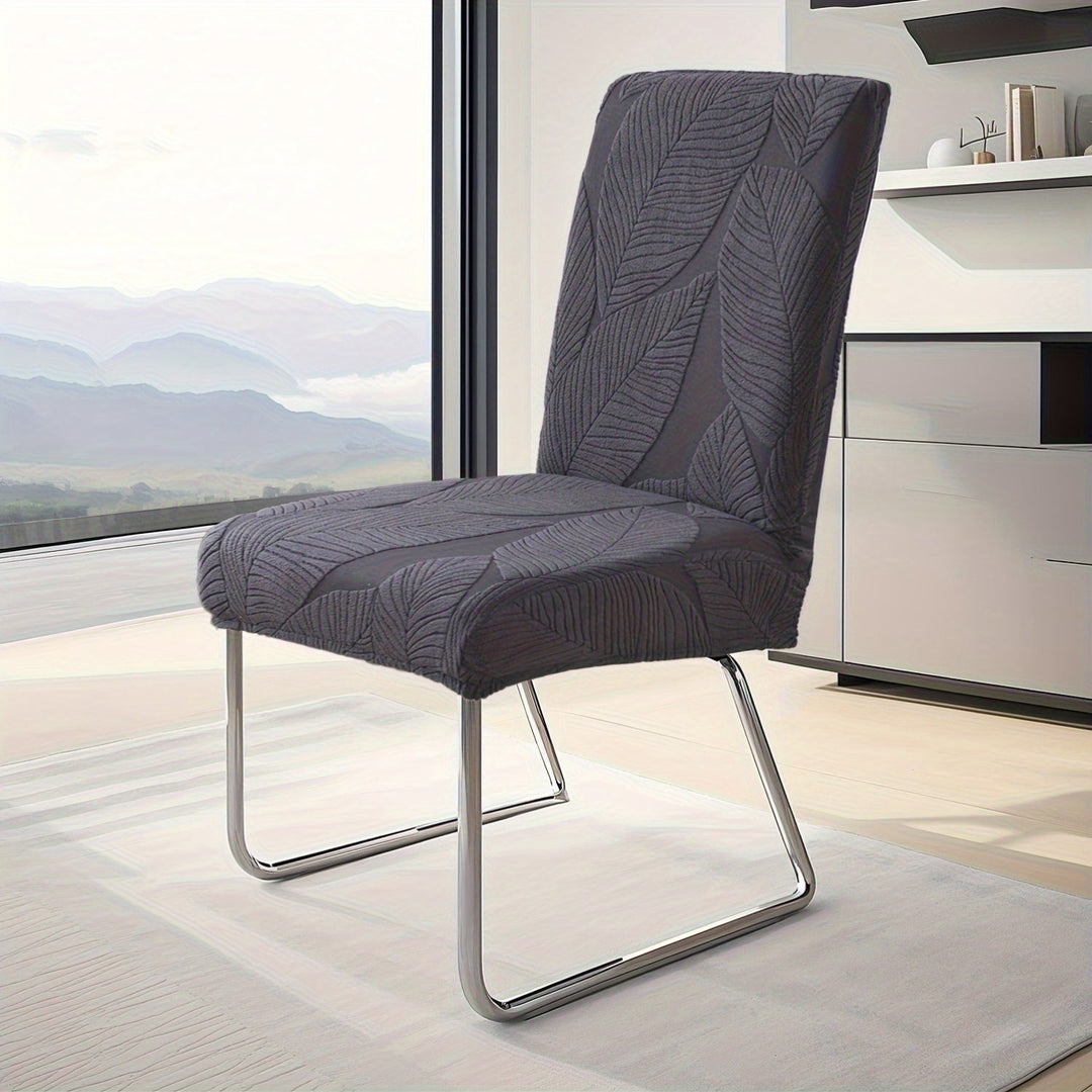 Protection de chaise extensible motif feuille, tissu polaire confortable et lavable.