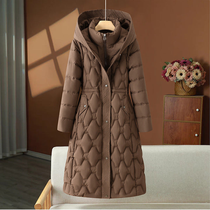 Manteau hivernal long et chic matelassé pour femmes, parfait pour l'élégance et la chaleur en saison froide.