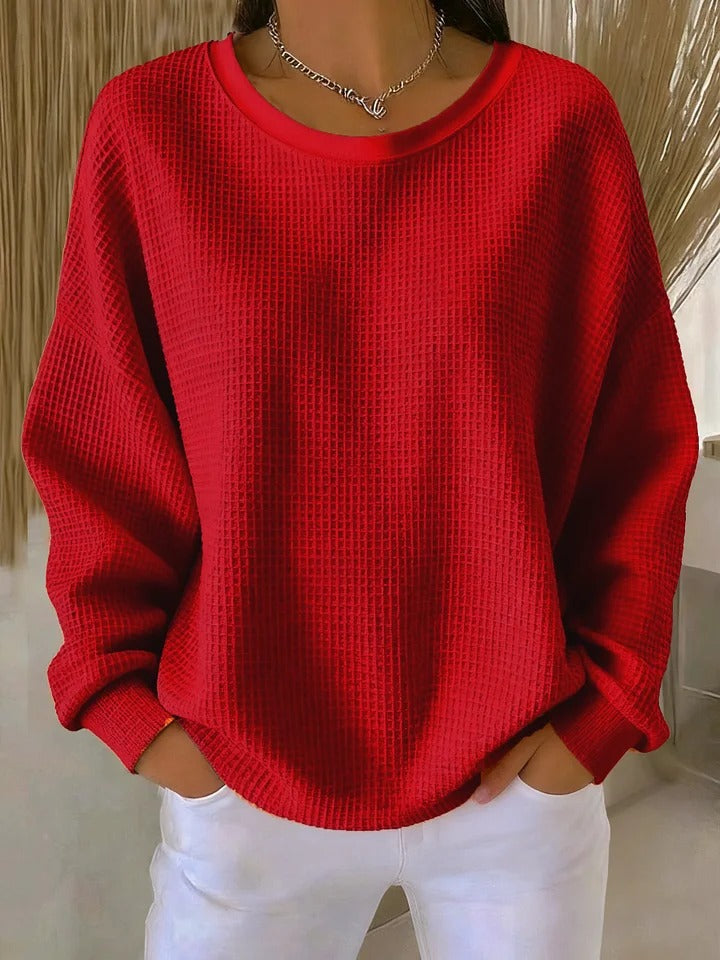 Tendance mode femme: sweat-shirt texturé casual, parfait pour un look moderne et stylé.