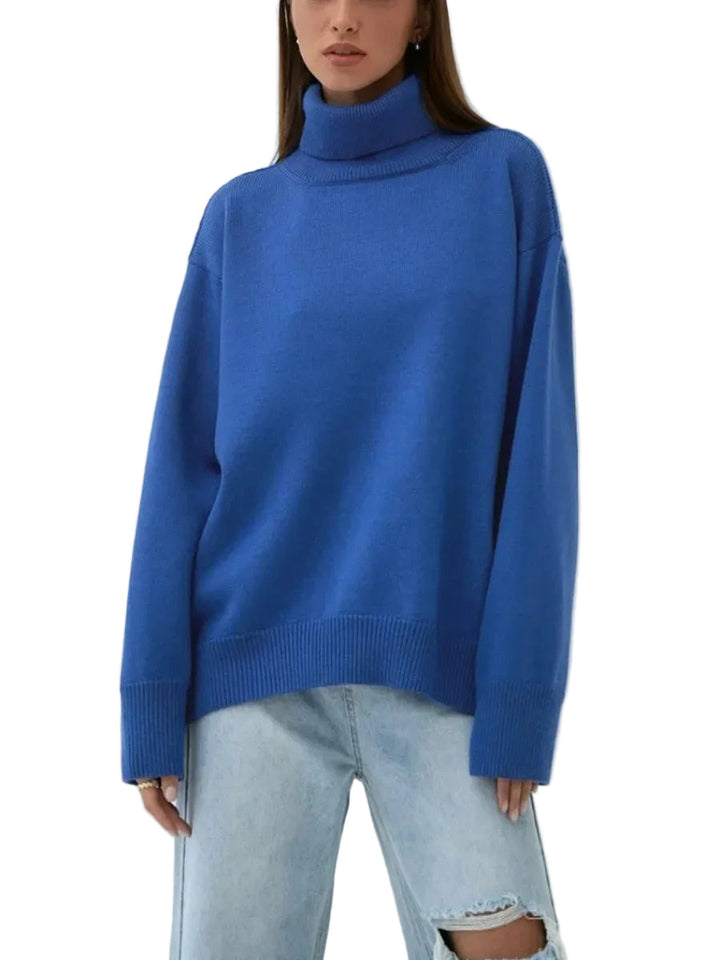 Pull femme oversize à col roulé doux, manches longues, pour confort et style casual élégant.