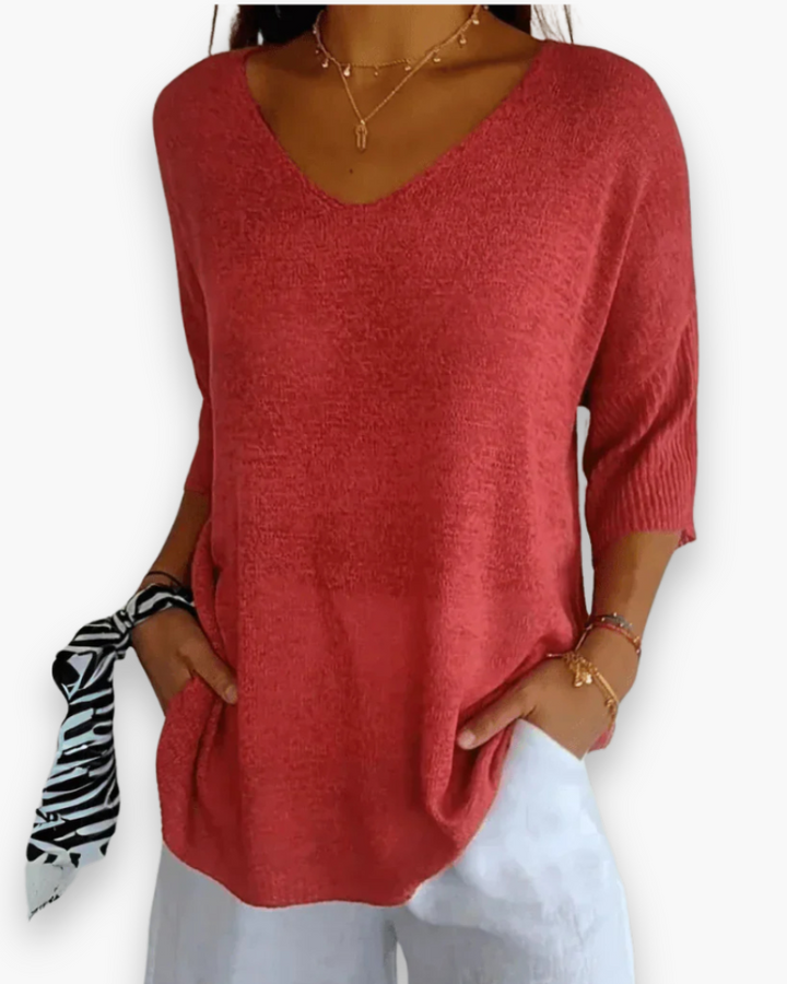 Pull femme chic et décontracté, col en V, manches 3/4 pour confort élégant au quotidien.