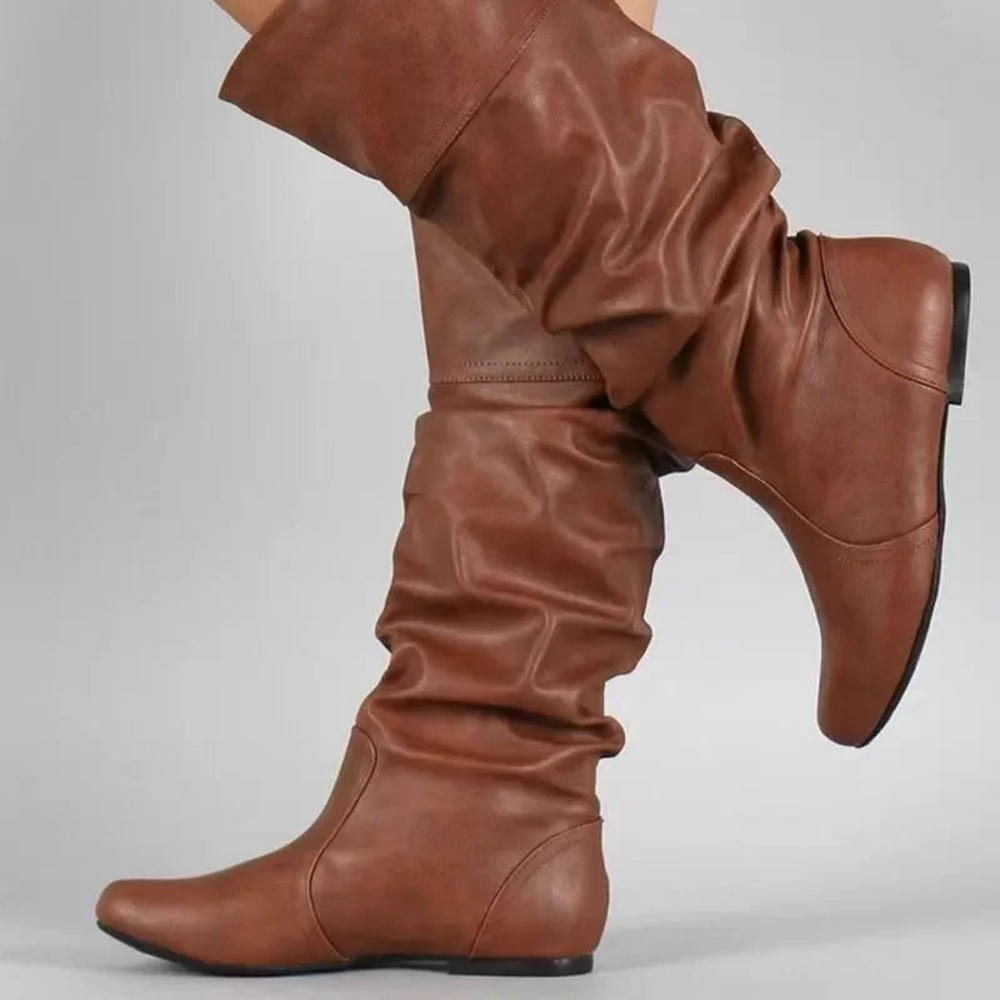 Chaussures d'hiver femme hautes avec semelle antidérapante, offrant confort et chaleur. Style élégant et durable.