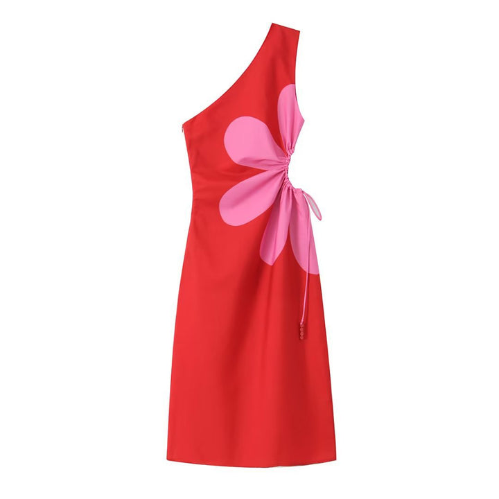 Motifs floraux vifs sur robe longue asymétrique Élégance Serena. Style épaule unique pour femme élégante.