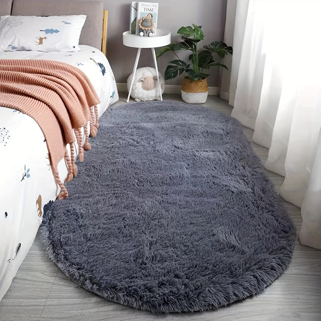 Tapis de chambre ovale en polyester lavable, doux, moelleux et très décoratif.