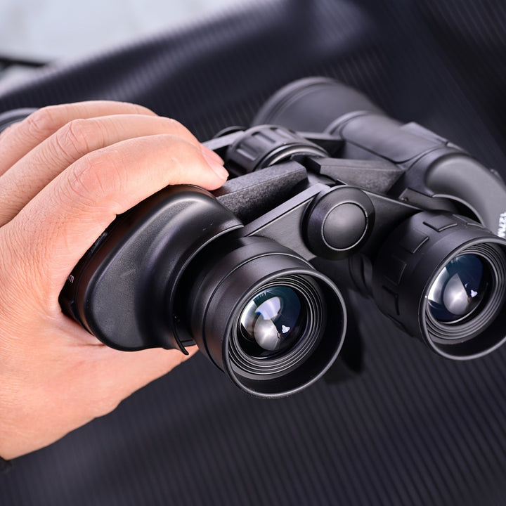 Jumelles 10x50 HD pour l'observation des oiseaux et de la faune sauvage. Portable et performante pour la nature.