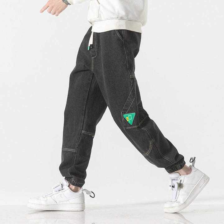 Pantalon jogger homme en coton doux, coupe décontractée, essentiel pour le confort printanier et automnal.