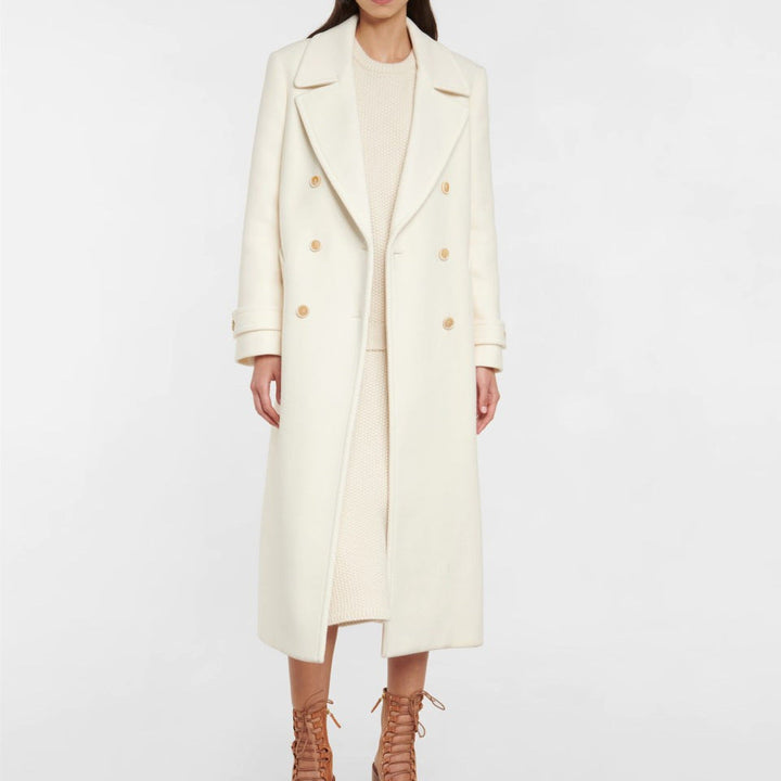 Manteau long croisé élégant pour femme, idéal automne/hiver. Vêtement extérieur chic et mode féminine.