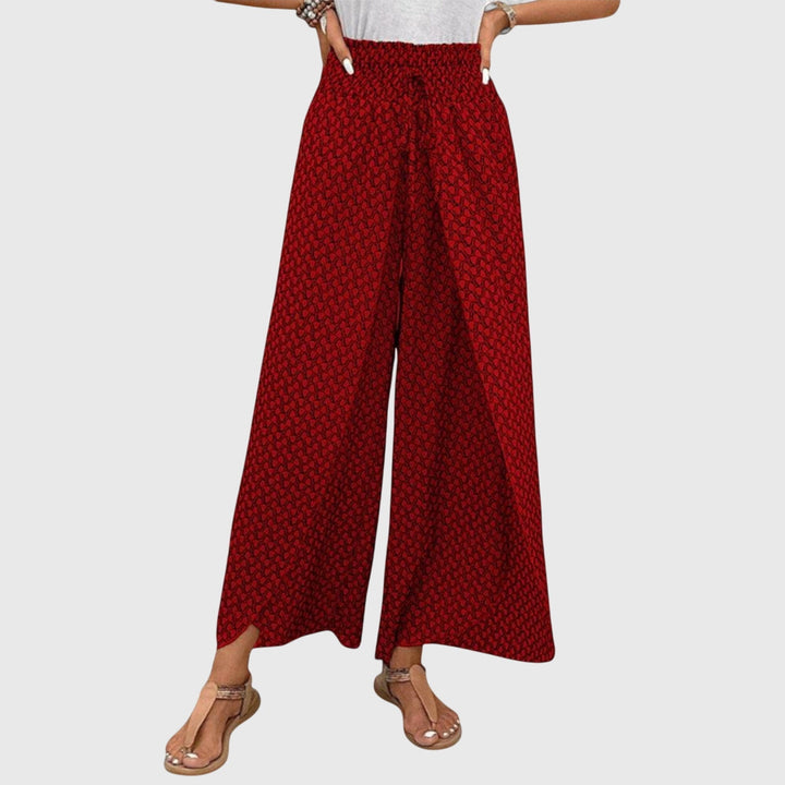 Pantalon palazzo femme chic et fluide, taille haute. Allie élégance et confort pour le quotidien.