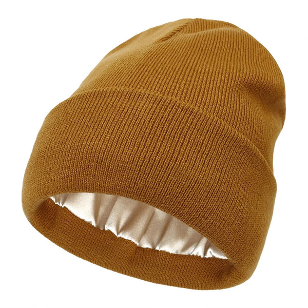 Chapeau d'hiver femme en laine douce, intérieur satin de soie pour protéger la coiffure du froid.