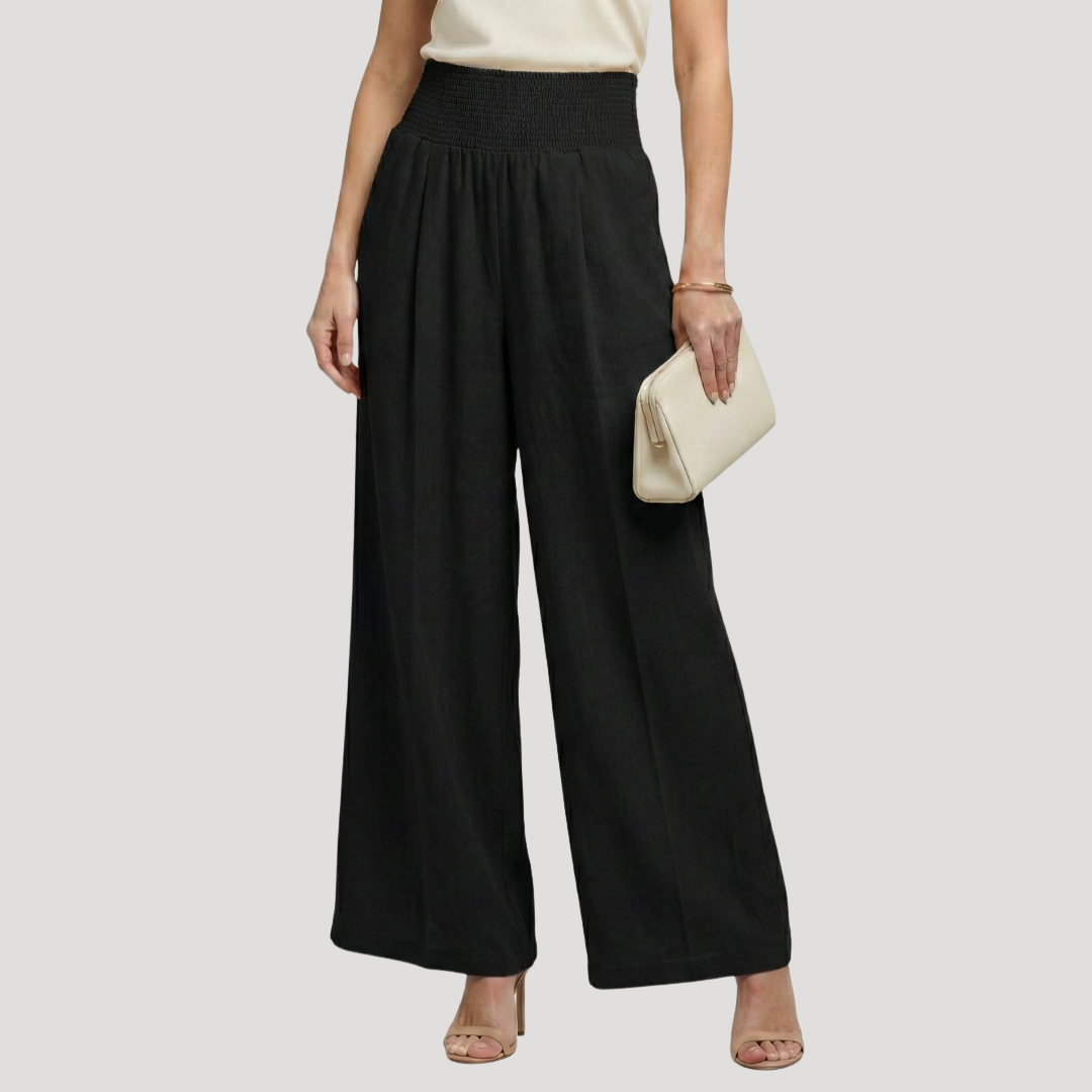 Pantalon femme élégant à jambes larges et taille smockée, parfait pour un look chic ou casual d'été.