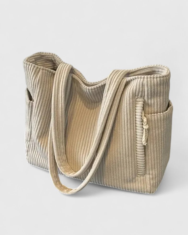 Sac fourre-tout Angelique vert. Pratique et stylé, ce cabas est un accessoire de mode indispensable.