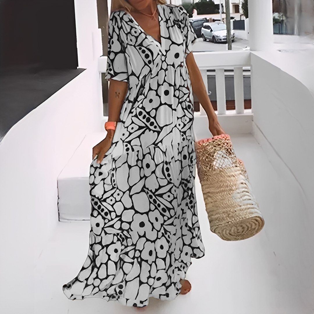 Robe longue fluide femme, confortable et élégante avec motif, parfaite pour un été décontracté et stylé.