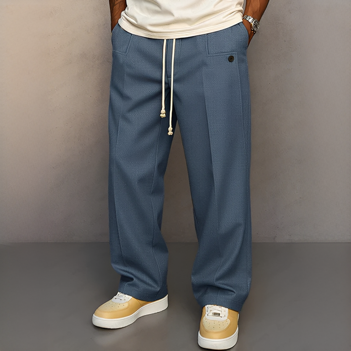 Pantalon sport homme à cordon, respirant et confortable pour les activités estivales et la détente.