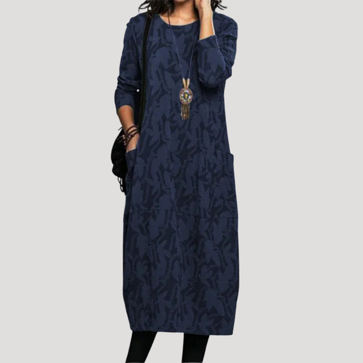 Robe midi femme décontractée à motifs, fluide et très confortable. Parfaite pour le quotidien, avec manches longues.