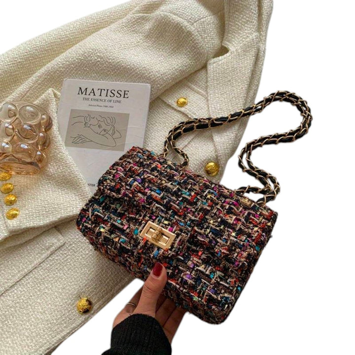 Intérieur organisé du sac bandoulière femme. Compartiments pratiques pour ranger vos essentiels.