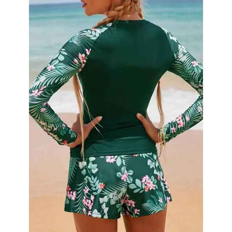 Maillot de bain femme 2 pièces, haut manches longues bleu, protection UV pour surf et piscine.