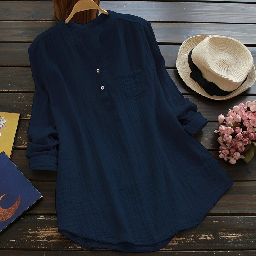 Haut femme décontracté mais chic, idéal pour le bureau ou une tenue estivale. Blouse ample et confortable.