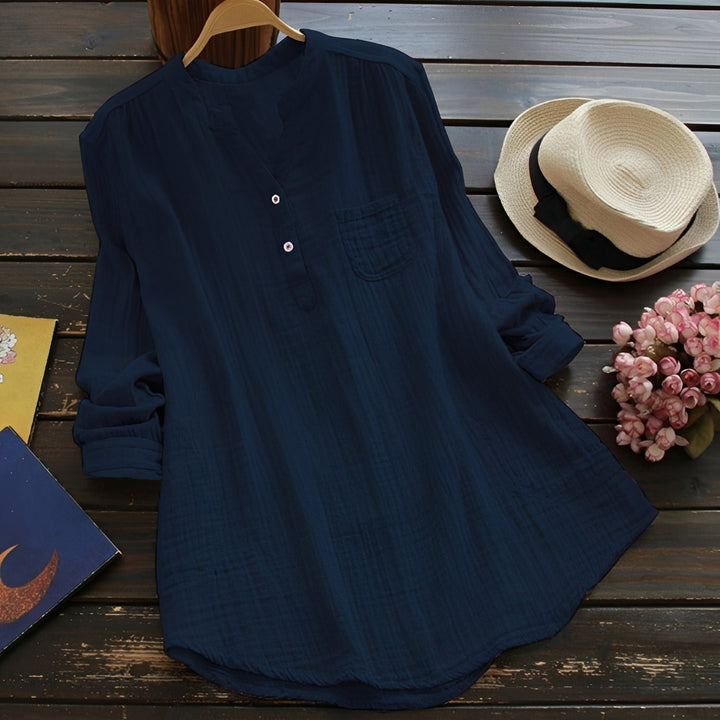 Haut femme décontracté mais chic, idéal pour le bureau ou une tenue estivale. Blouse ample et confortable.