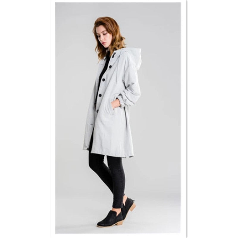 Manteau de pluie femme élégant, idéal mode printemps/automne, protection et confort garantis pour les grandes tailles.